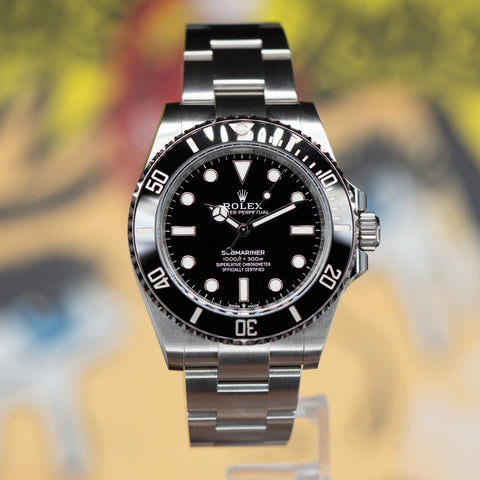Rolex Submariner 124060 with black dial and steel Oyster bracelet from Pucks & Timepieces inventory