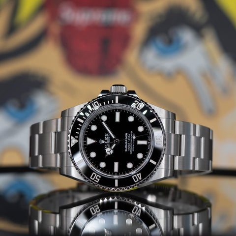 Rolex Submariner 124060 from the Pucks & Timepieces pre-owned inventory