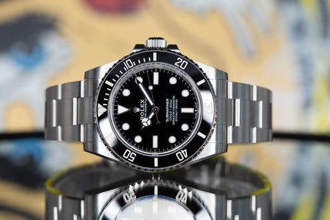Rolex Submariner 41mm no-date with black ceramic bezel, photographed by Pucks & Timepieces