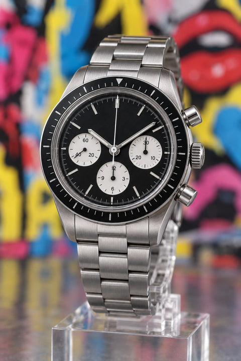 Illustrative black-dial chronograph for the OMEGA Speedmaster buying guide