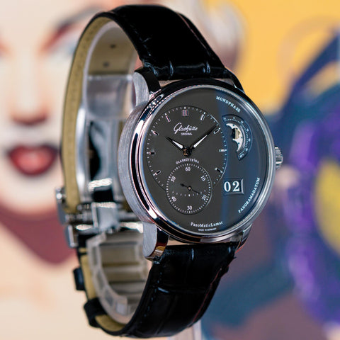Glashütte Original PanoMaticLunar laxury watch with Pucks and timepieces 